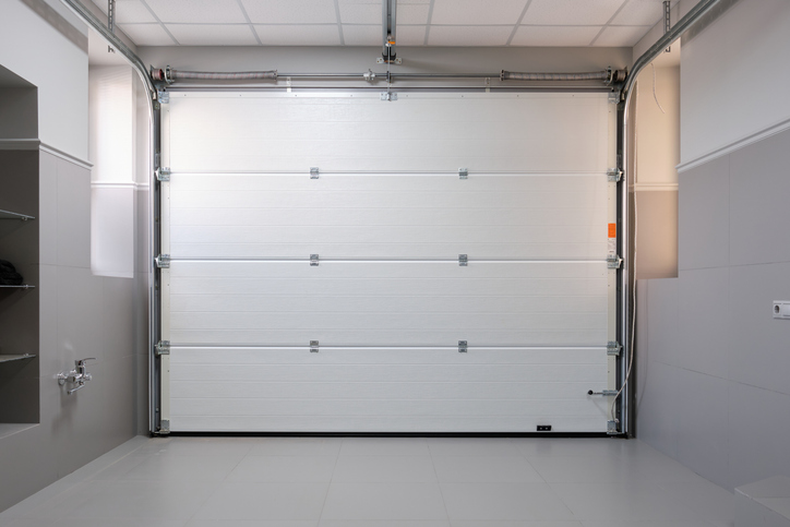 Garage Door Maintenance for Rental Properties: A Landlord’s Guide