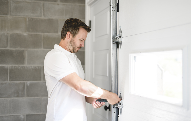 How Garage Door Repair Extends the Life of Your Entire System