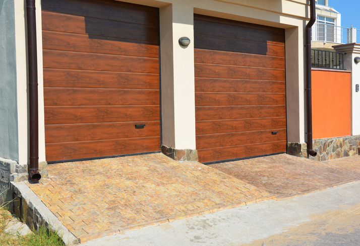 How Weather Affects Garage Door Replacement Panels Over Time