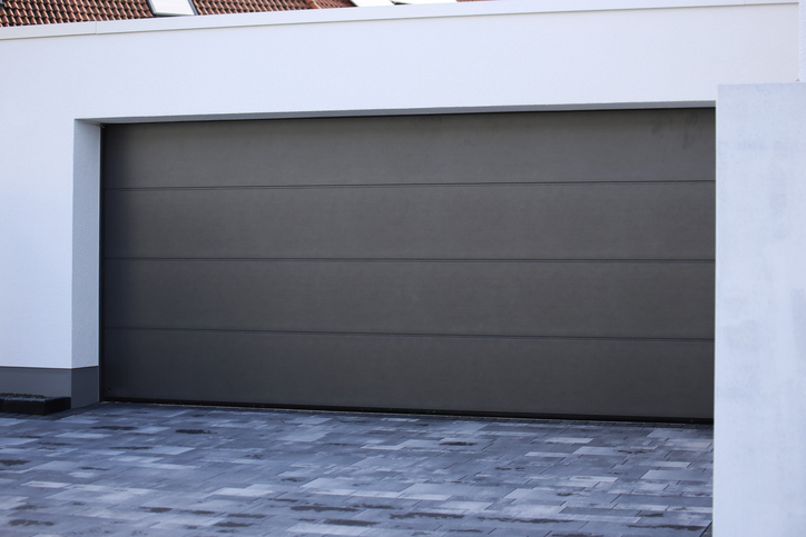 When to Replace vs. Repair Your Commercial Garage Door