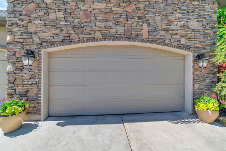 Signs It’s Time to Schedule Garage Door Opener Services