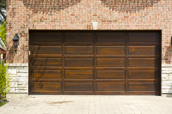 Why Timely Garage Door Opener Installation Prevents Major Repairs